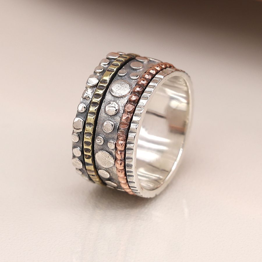 Sterling silver, brass and copper spinning ring with bubble design