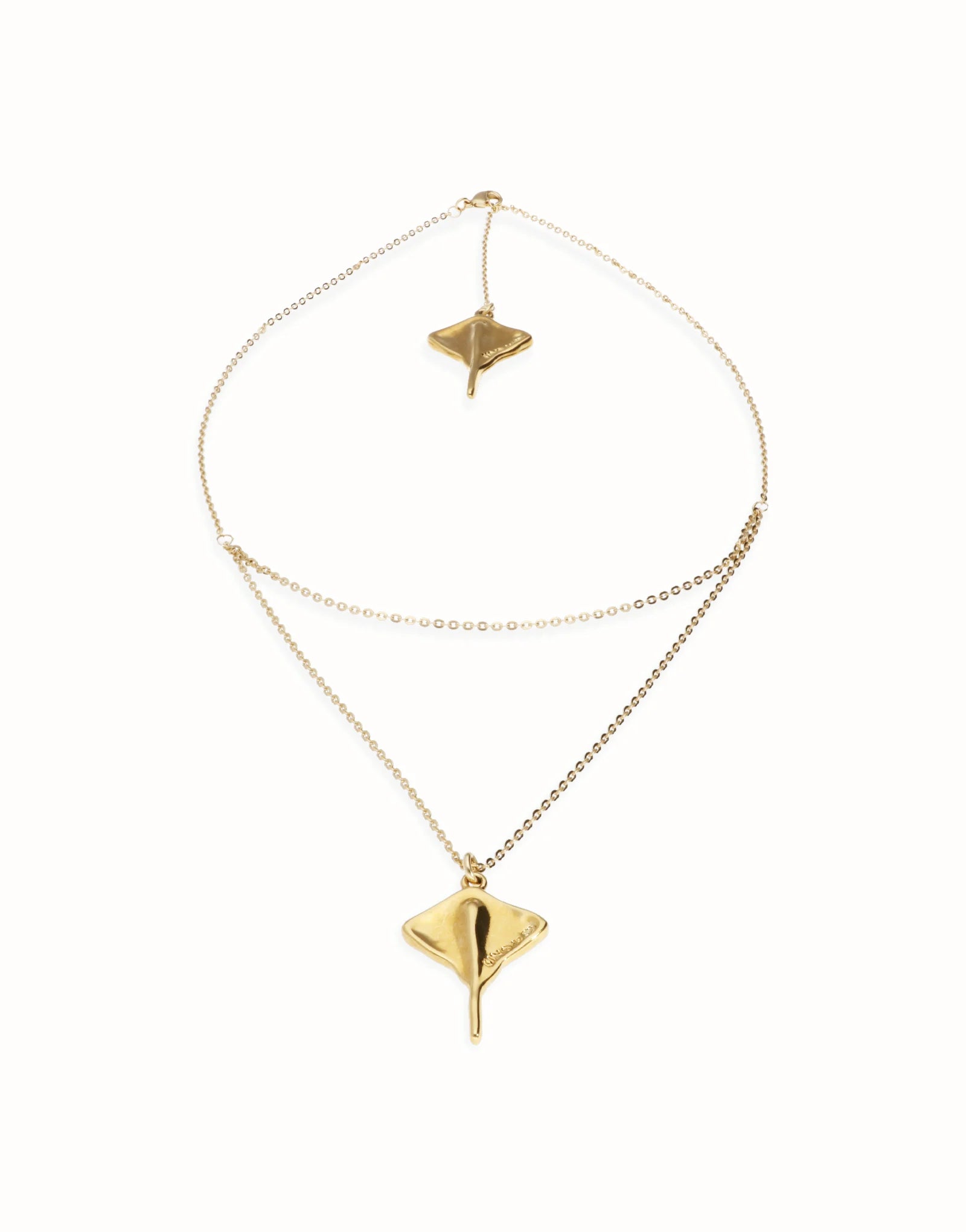 Multi strand chain necklace with manta ray