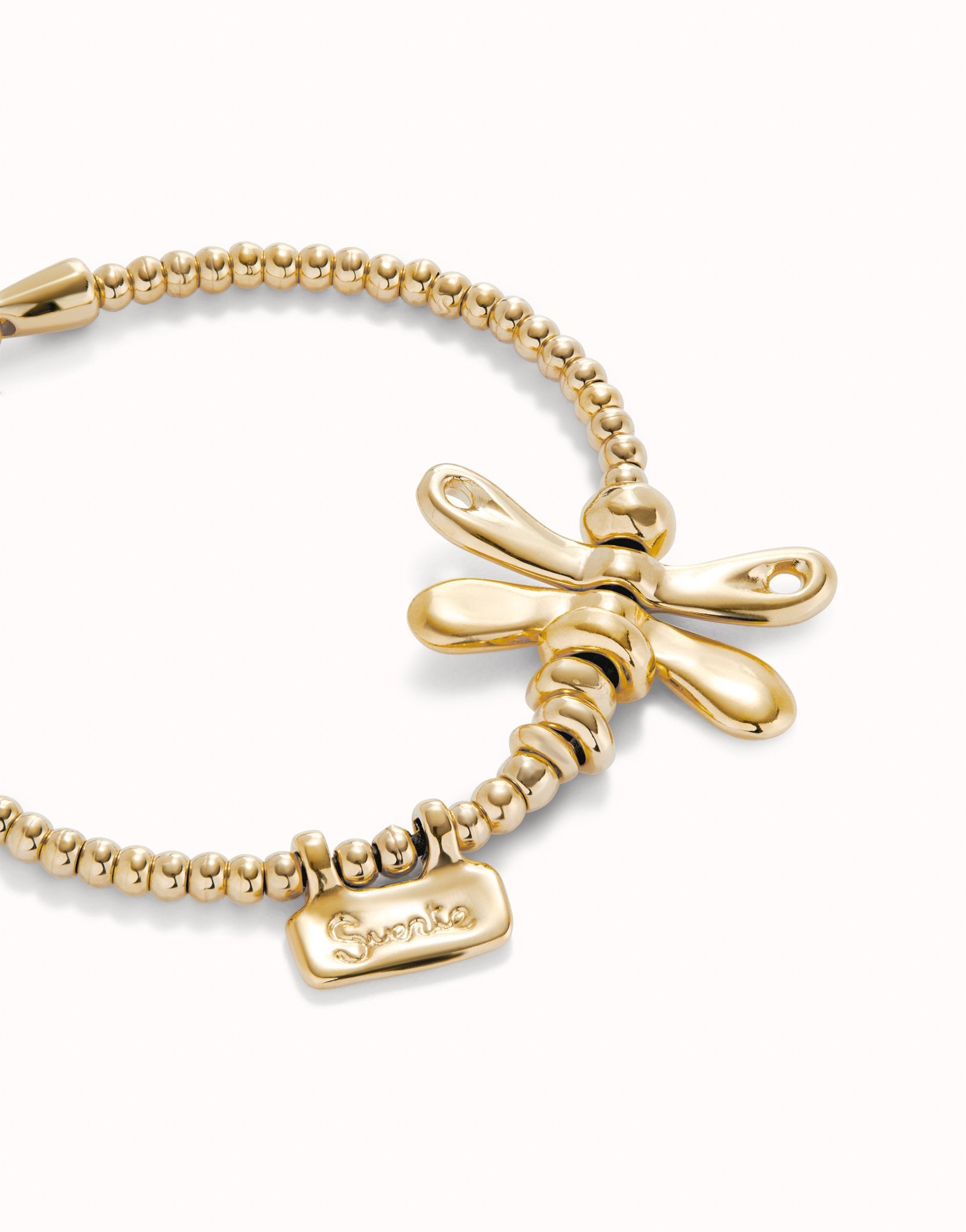 Elastic bracelet with 18K gold-plated dragonfly