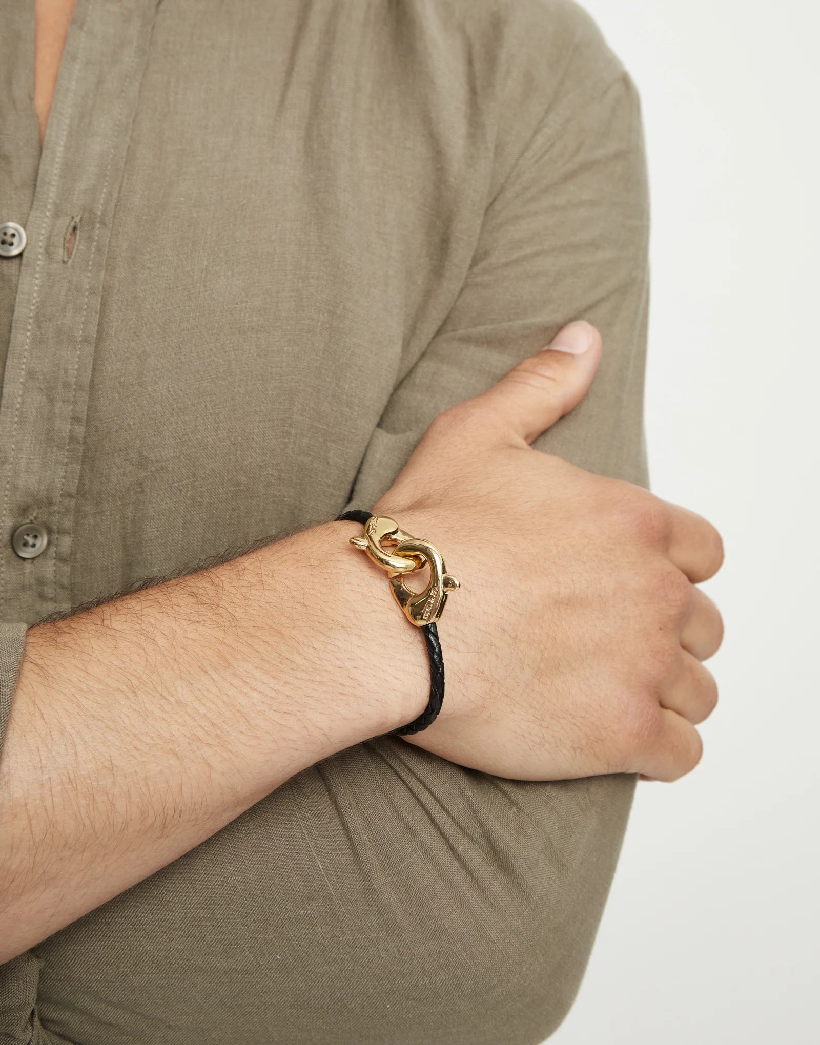 Black leather bracelet with interlocking carabiner