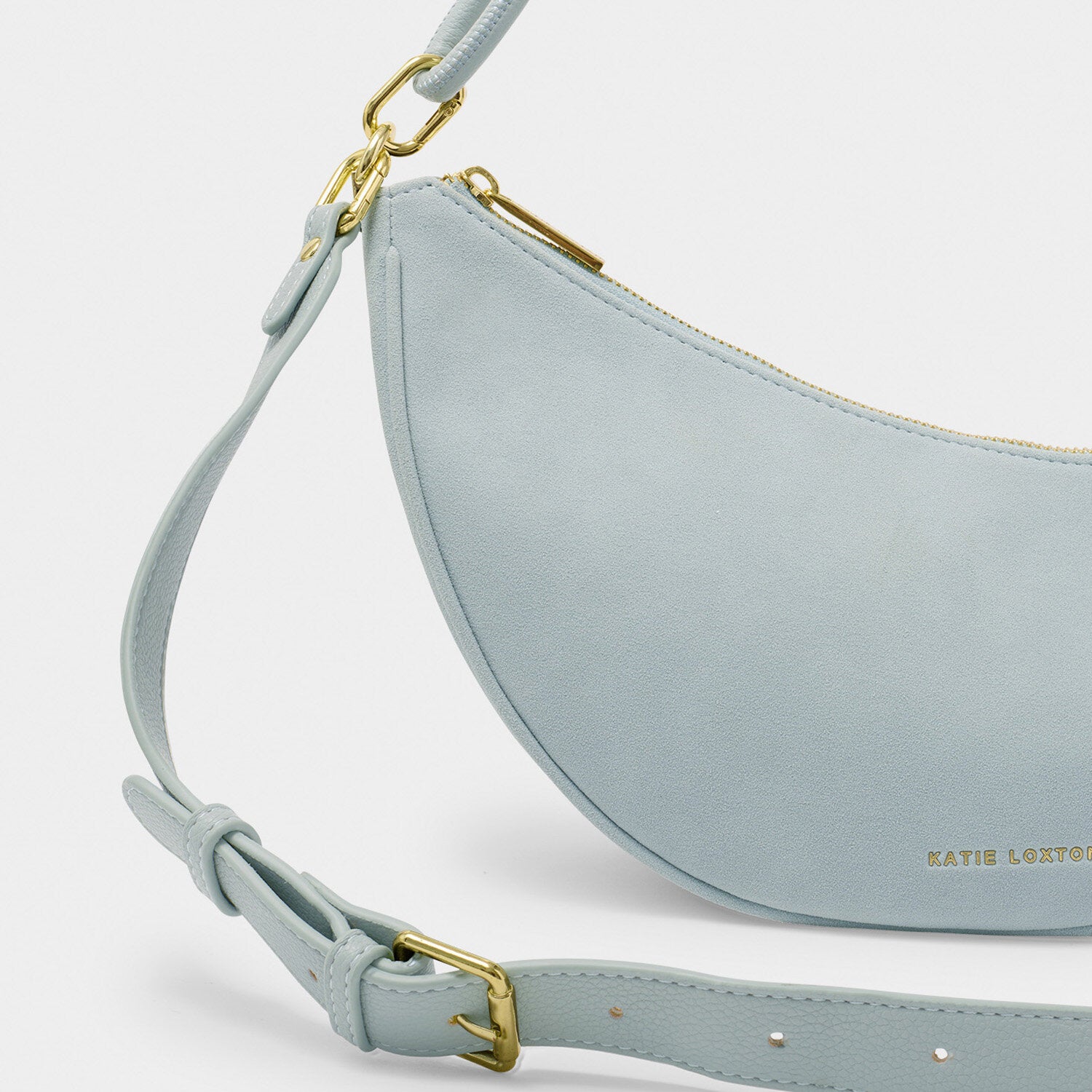 Katie Loxton - Asha Sling Bag - Blue Mist Suedette